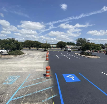 Freshly sealed parking lot in summerville sc with bright clean striping
